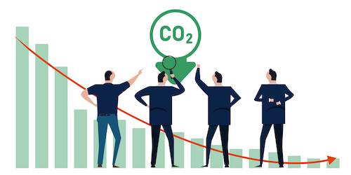 Image of business people examining a graph of declining CO2 emissions